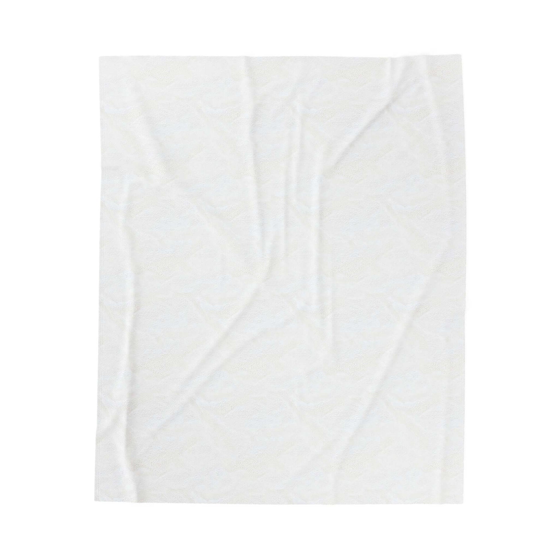 Soft white velveteen plush blanket, perfect for creating a cozy home atmosphere. Ideal for comfort and warmth.